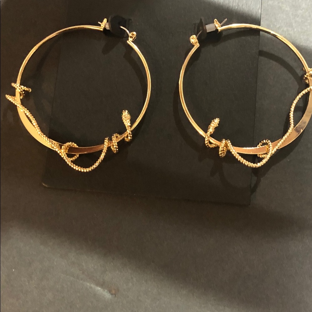 Steve Madden gold toned emerald eyed coiled snake serpent hoop earrings new